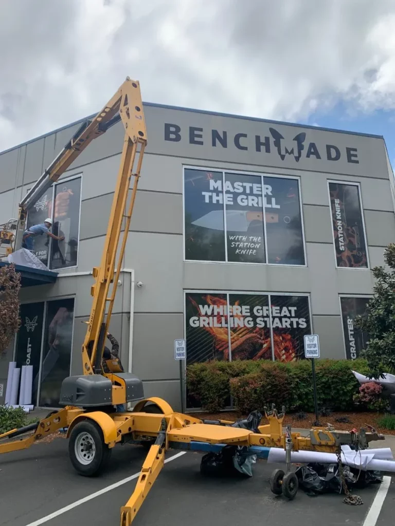 Corporate window graphics and building signage for Benchmade in Portland, OR